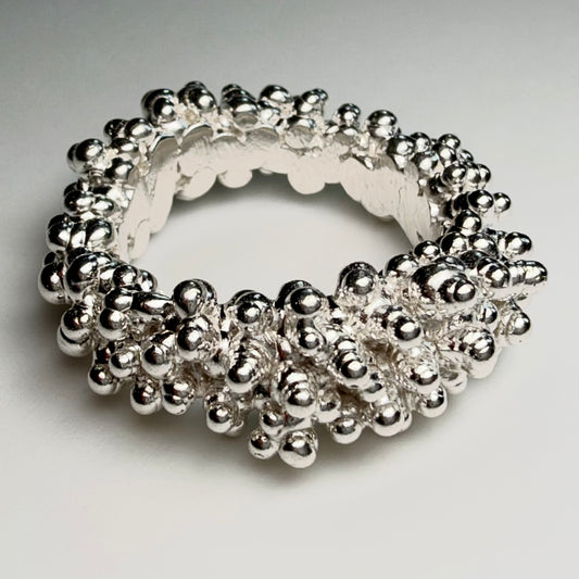 Ring For A Sushi Restaurant - Andrea Corson
