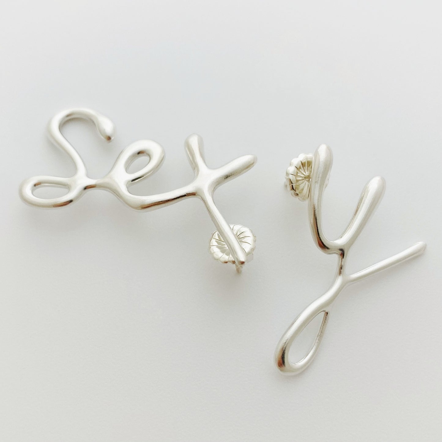 Sex y Earrings, sterling silver